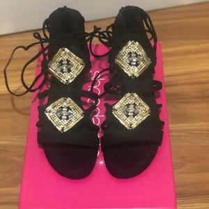 Black with gold design wrap around sandals
